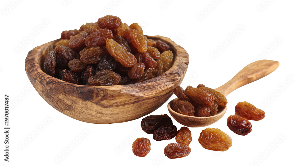 Obraz premium Rustic wooden bowl, spoon overflowing with dark brown wrinkled raisins