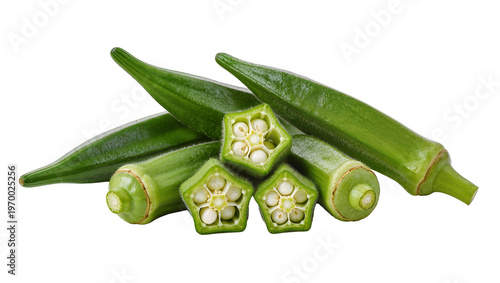 Quadro su tela Fresh green okra pods, sliced open revealing creamy white seeds inside