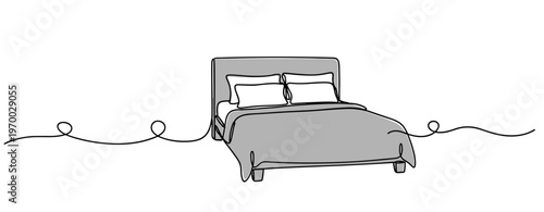 Double bed positioned with pillows in minimalist line setting