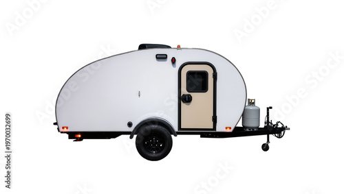 Billede på lærred Compact teardrop camper trailer beige door black tires, propane tank attached