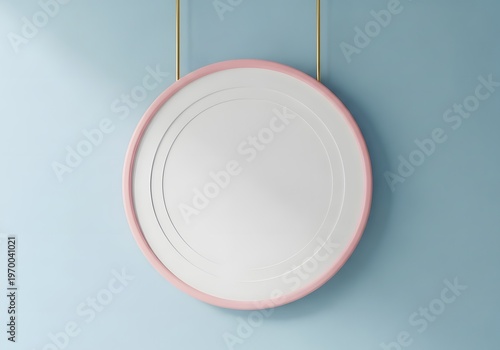 A white plate with a pink rim hanging on a blue wall