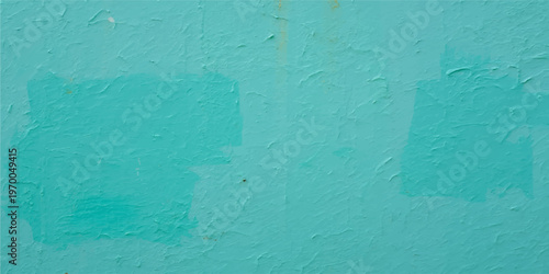 A vintage blue painted wall features a rough grunge texture and weathered cement pattern, creating a blank plaster backdrop with a dirty, old material surface for architectural design