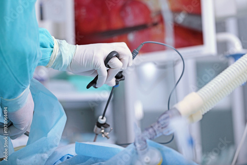 Bild auf Leinwand Laparoscopic instruments in the hands of a surgeon