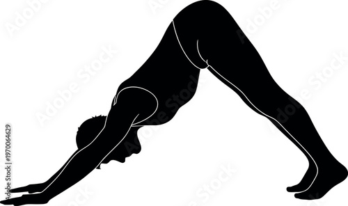 Silhouette of a person in downward facing dog yoga pose