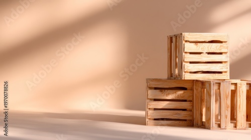 Stacked wooden crates on a warm background with natural light and shadow patterns offering ample copy space