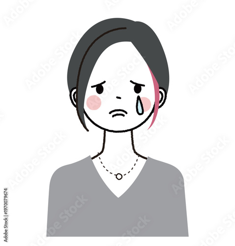 インナーカラーのショートボブの女性　悲しそうな顔で涙を流して泣いている女性