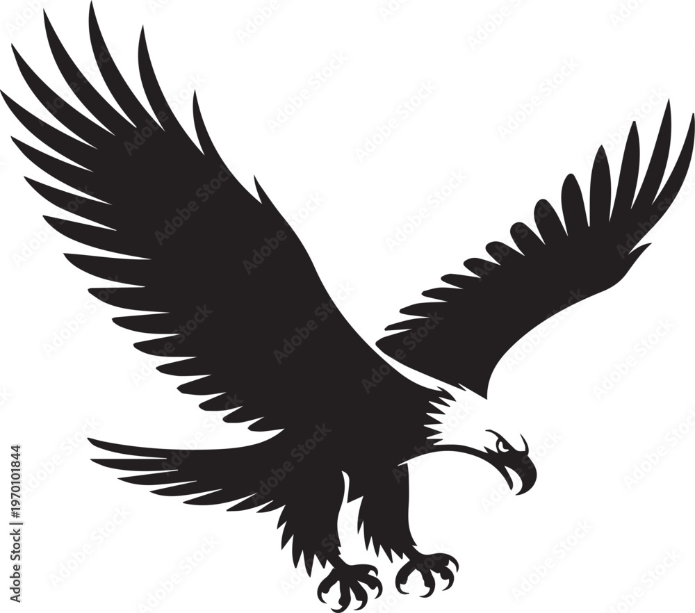 Fototapeta premium A black silhouette of an eagle in mid-flight 