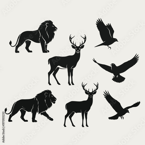 A collection of black silhouettes of wild animals and birds on a plain background