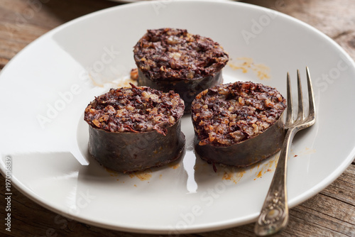 Burgos blood sausage served on a plate in a rustic atmosphere