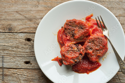 Burgos Blood Sausage Served With Tomato Sauce on a Plate