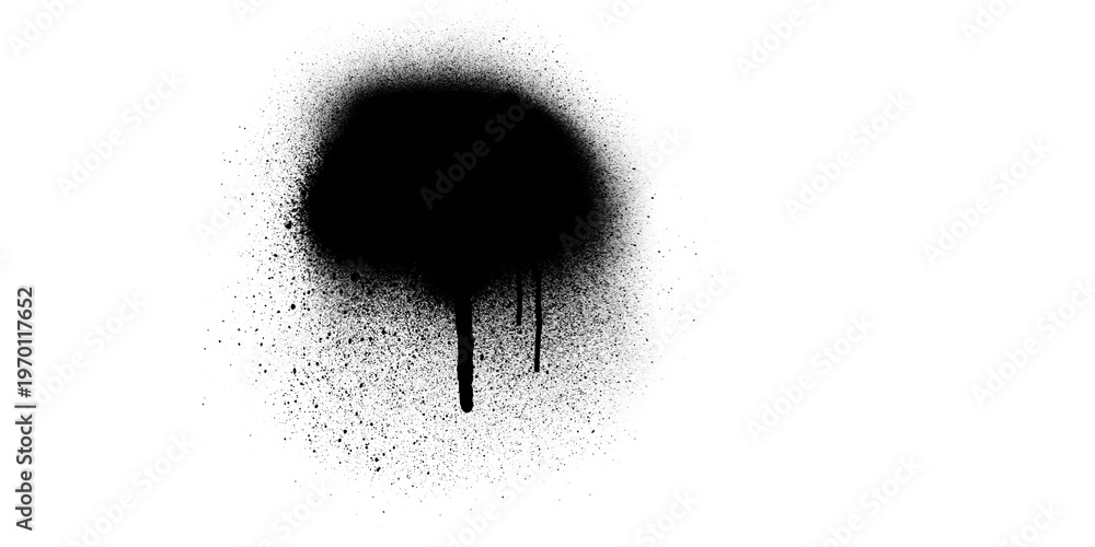 Fototapeta premium A circular black spray paint mark featuring an intense concentration of pigment with a drip effect