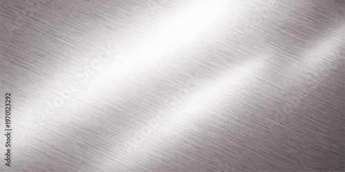 Polished stainless steel plate featuring a brushed metallic silver texture and a smooth industrial grey surface with light reflections for a seamless aluminum backdrop pattern