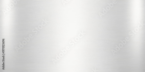 A shiny brushed metal texture background with a silver steel surface and industrial pattern design