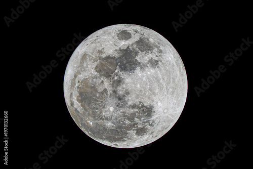 Full moon close up detailed lunar surface isolated in black night sky with visible craters and maria texture astronomy. Space object high resolution moon disc astrophotography celestial body view.