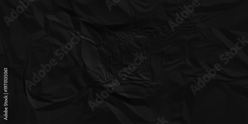 Black paper wrinkled texture for background space. Rough black paper. Paper texture, recycled creased paper background.