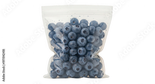 Fresh organic blueberries packed inside a transparent resealable plastic storage food bag isolated on transparent background