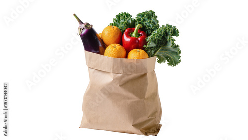 Brown paper bag overflowing with vibrant eggplant oranges red bell pepper, and kale