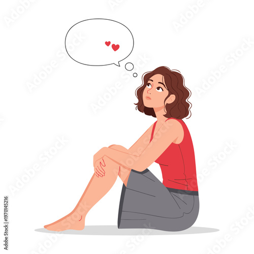 Young woman sitting on the floor while dreaming about love with hearts in a thought bubble.