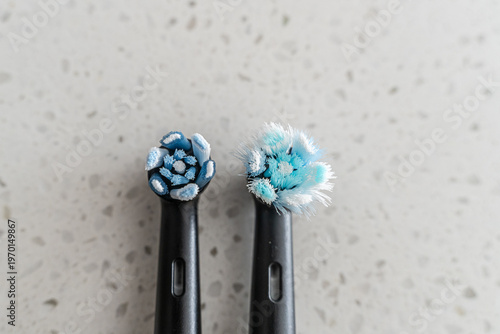 electronic used and new toothbrush heads to brush teeth