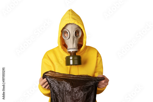 Individual wearing a yellow hoodie and gas mask, holding a black plastic bag, isolated on transparent background. Concept of protection, danger, or environmental concern.