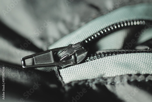 Fotografia A close-up view of a zipper on a casual jacket, useful for fashion or outdoor th