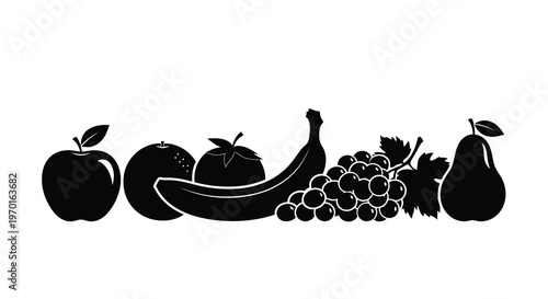 A vibrant assortment of fruits displayed in a striking black silhouette