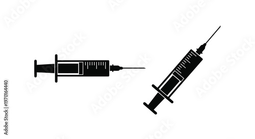 Two medical syringes are depicted in a stark black silhouette
