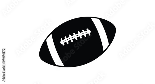 A striking black and white image depicts an american football with prominent stitching details a bold silhouette