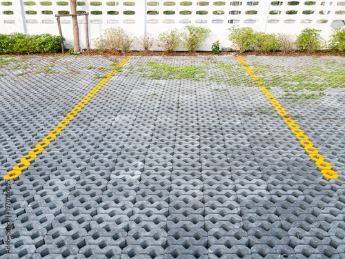 Eco Friendly Permeable Paver Parking Lot with Yellow Lines