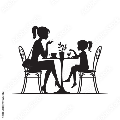 Silhouette of a mother and daughter sharing a meal together