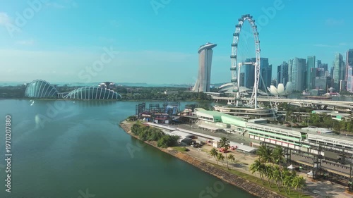 Marina bay, Singapore: Aerial view of famous island country and city-state - landscape panorama of Southeast Asia from above
