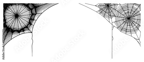 Vintage woodcut style illustration of spider webs in corners for decorative borders