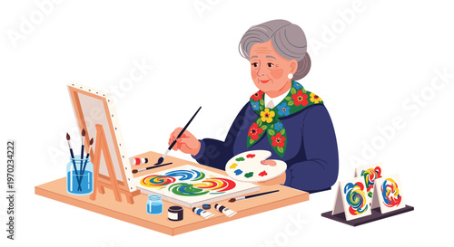 An elderly woman sits at a wooden table, painting a colorful abstract design on a canvas with various art supplies.