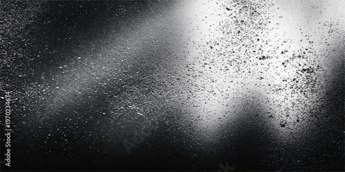 Abstract spray-paint artwork, using a variety of monochromatic shades to give a textured appearance.