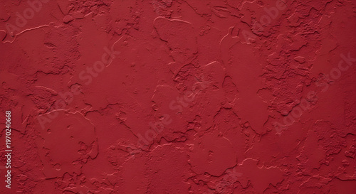 Textured Dark Red Stucco Wall Background with Rough Plaster Surface