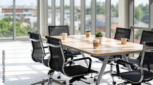 Schilderij op canvas Modern, bright empty meeting room with a large table and office chairs in a corporate office building