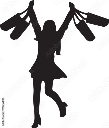 Silhouette of a happy woman jumping with shopping bags in her hands