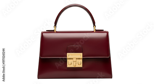 A luxurious burgundy handbag with a structured shape and gold hardware for a sophisticated look isolated on transparent background