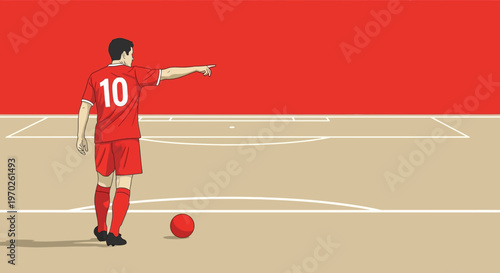 Soccer player in red uniform pointing.