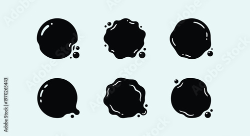 Set of black ink or oil blotches and splatters.