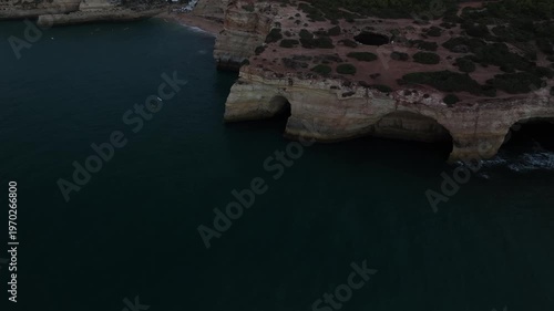 Cinematic Aerial View of Benagil Sea Caves and Algarve Coast, Portugal