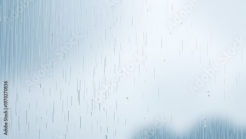 Heavy rain falling against a plain solid color background. 