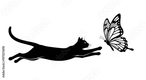 Black cat chasing a butterfly in a playful moment.