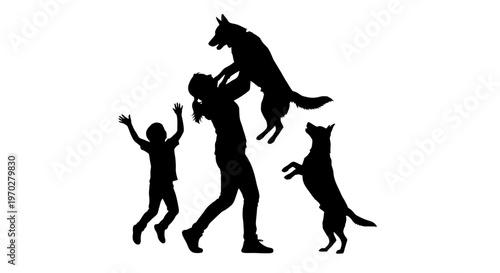 Happy family playing with their beloved dogs in a joyful outdoor setting.