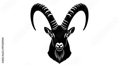 Majestic black and white goat head with impressive horns, a powerful and striking animal portrait.
