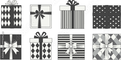 Eight black and white gift boxes with bows wrapped presents for holiday celebration.