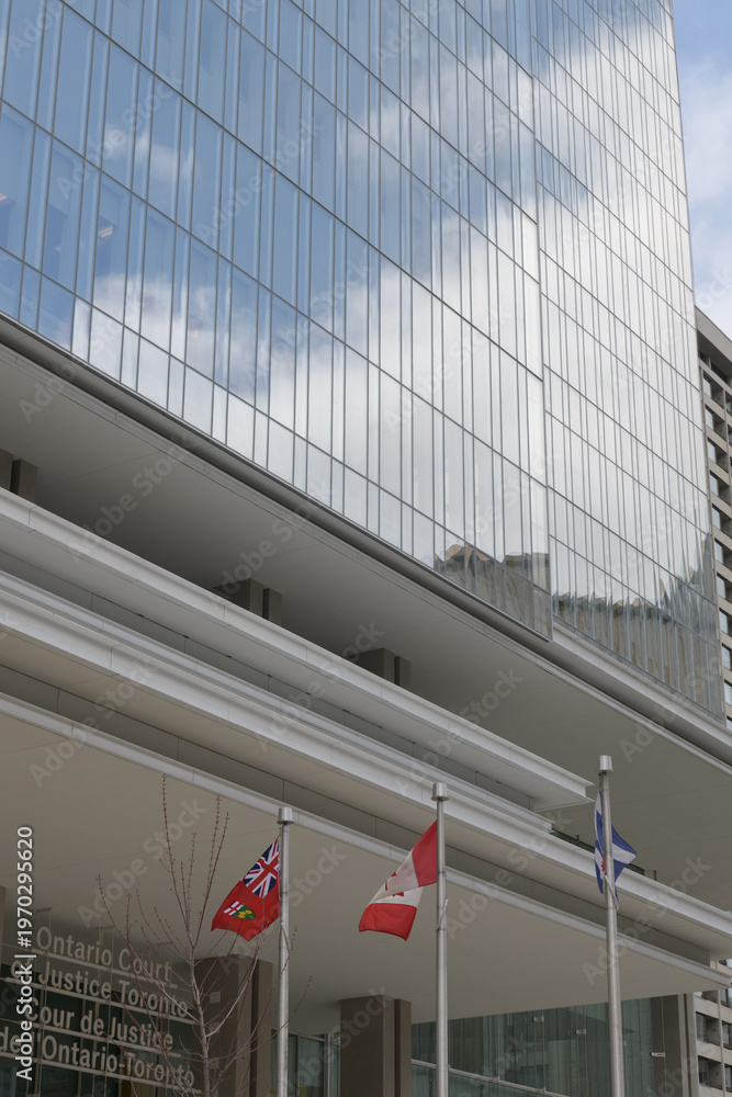 Fototapeta premium exterior of 10 Armoury Street, a courthouse, known as Ontario Court of Justice, designed by Renzo Piano Building Workshop, Toronto