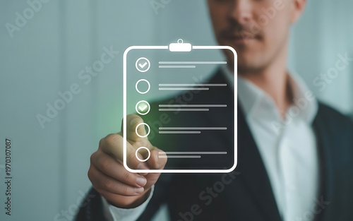 A businessman uses his finger to push a virtual interface button on a mobile touchscreen, representing a future concept of digital network communication and global business technology