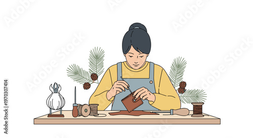 A person is crafting a small leather wallet at a wooden table surrounded by tools and pine branches.