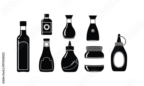 Assorted condiment bottles and containers in various shapes and sizes